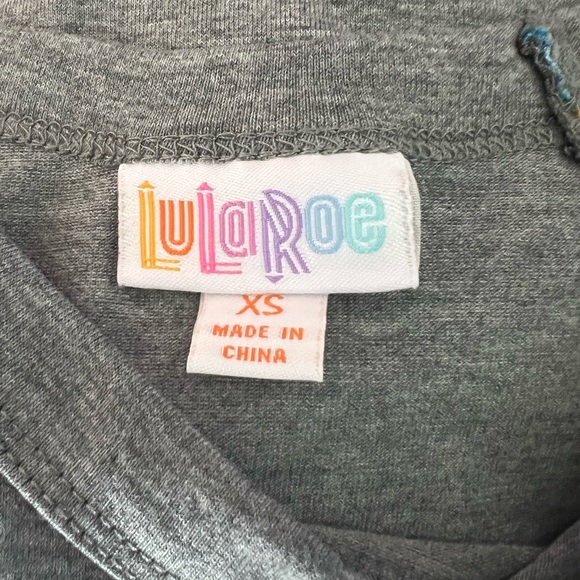 Lularoe Randy Raglan Gray with Blue & Mustard Yellow Patterned Sleeves - Picture 4 of 4